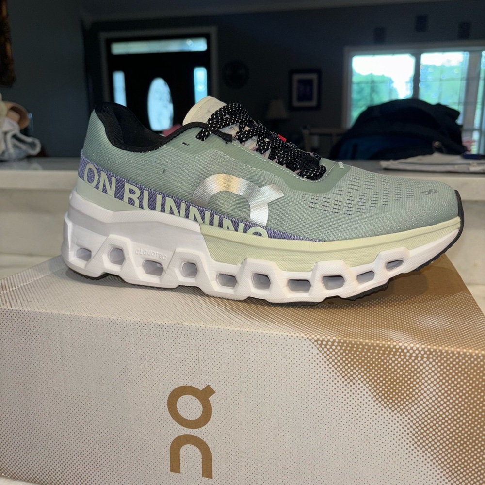 On Running Green and Black Sneakers for Active Lifestyle